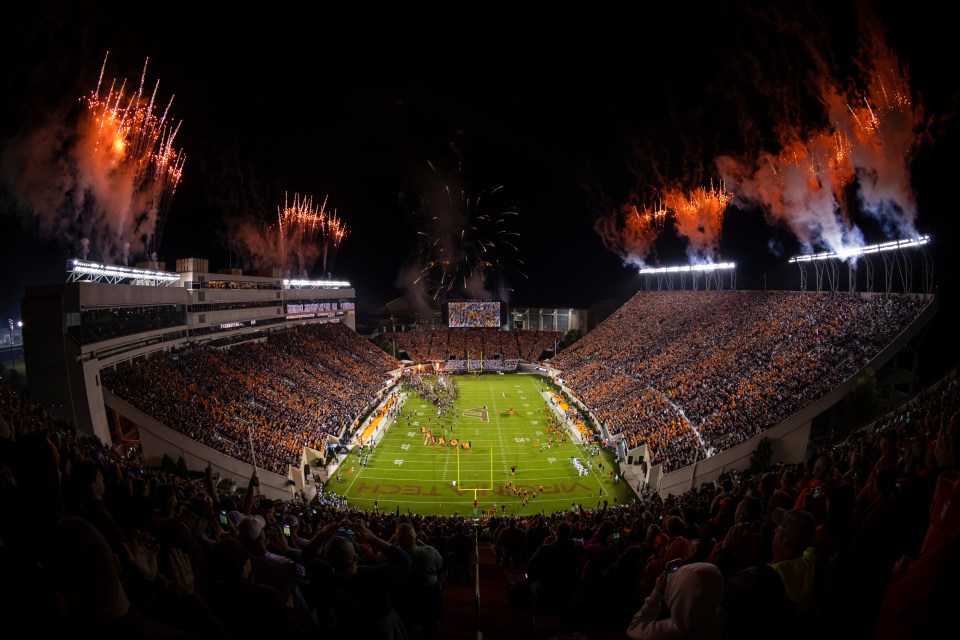 BLACKSBURG, VA - OCTOBER 09: Fireworks explode as the Virginia Tech Hokies take the field before the game against the Notre Dame Fighting Irish at Lane Stadium on October 9, 2021 in Blacksburg, Virginia. (Photo by Scott Taetsch/Getty Images)