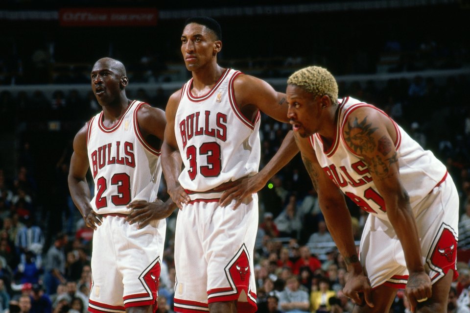 CHICAGO - 1997:  Michael Jordan #23, Scottie Pippen #33 and Dennis Rodman #91 of the Chicago Bulls catch their breath during a 1997 NBA game at the United Center in Chicago, Illinois. NOTE TO USER: User expressly acknowledges that, by downloading and or using this photograph, User is consenting to the terms and conditions of the Getty Images License agreement. Mandatory Copyright Notice: Copyright 1997 NBAE (Photo by Andrew D. Bernstein/NBAE via Getty Images)